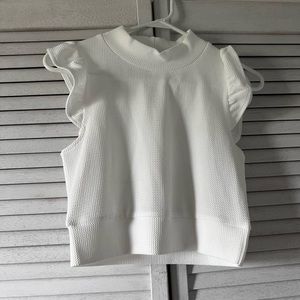 White ruffled top
